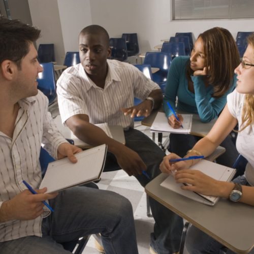 University students in discussion in the classroom